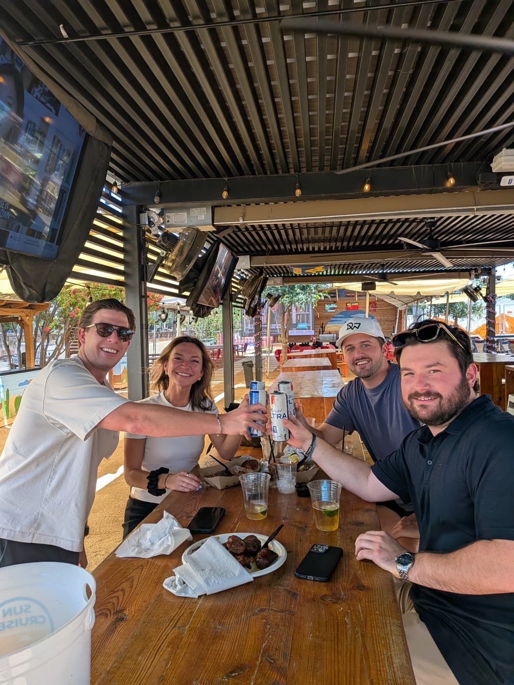 Game 7 teammates at a patio bar