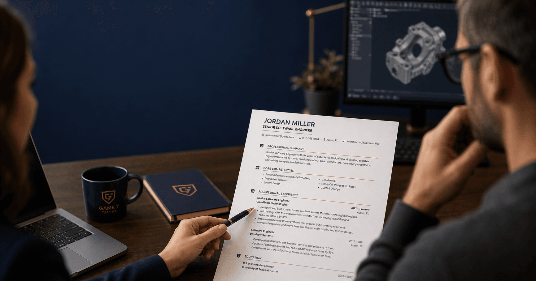 Engineer and recruiter reviewing an engineering resume